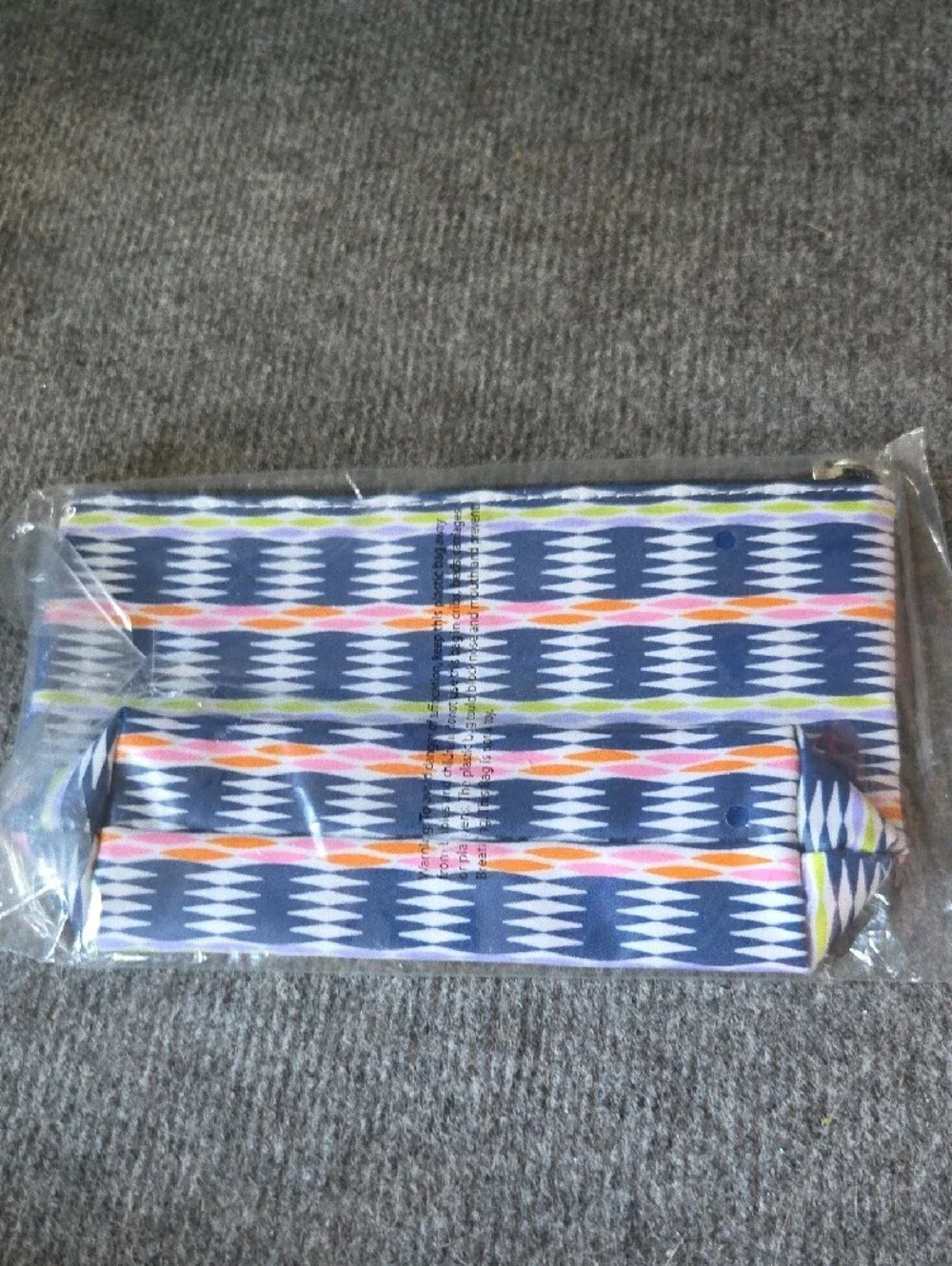 Scout Twiggy Makeup Bag in Navy with White, Orange, Green and Purple Accents